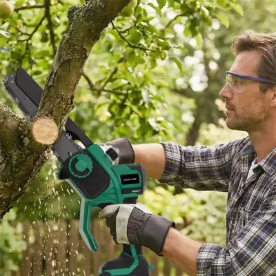 Green Lion 1100W cordless Electric Chainsaw with Brushless Motor, 6-inch Bar, 20v Battery, And Tool-free Chain Adjustment
